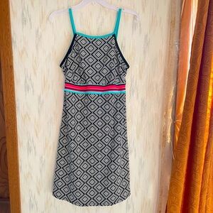 Title Nine Women's High Nice
Swim Dress Size L
Removeable Padded Cups